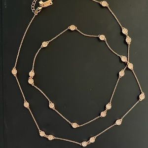 Long Kate Spade necklace in rose gold, barely worn without tags.